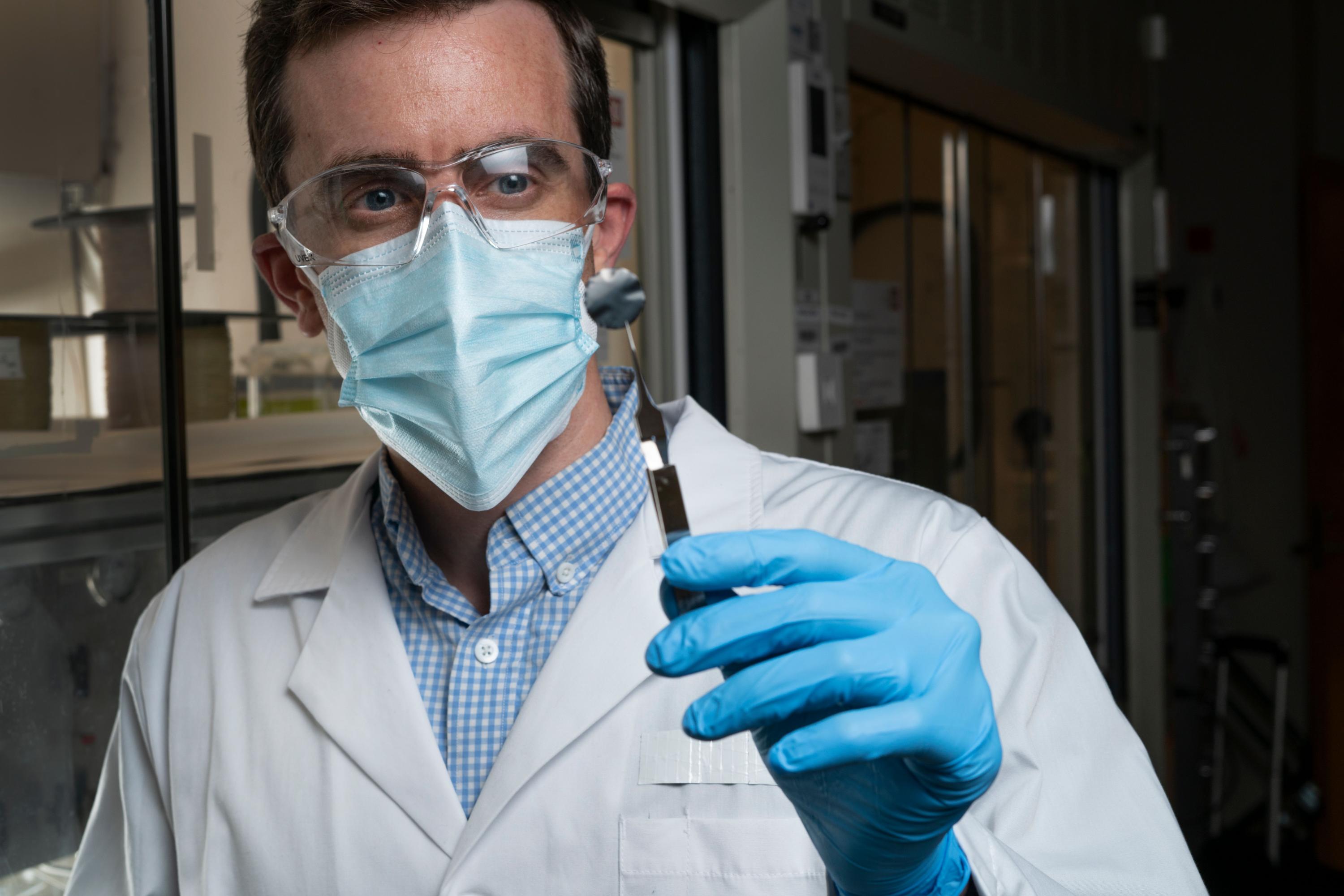 Georgia Tech Associate Professor Ryan Lively holding a small sample used to experimentally understand how the xylenes transport through the carbon structure. (Photo credit: Christopher Moore, Georgia Tech) Georgia Tech Associate Professor Ryan Lively holding a small sample used to experimentally understand how the xylenes transport through the carbon structure. (Photo credit: Christopher Moore, Georgia Tech)
