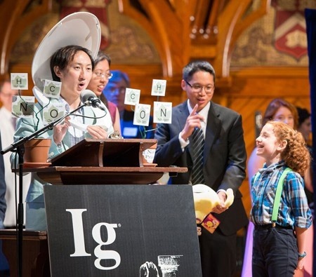 David Hu accepts the Ig Nobel Prize. David Hu accepts the Ig Nobel Prize.